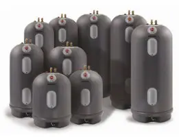 A group of water heaters that are all lined up.